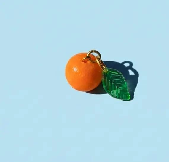 orange clay charm